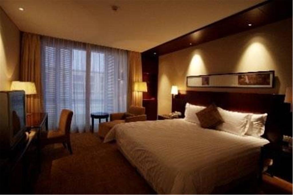 Howard Johnson Plaza Lingang Shanghai Nanhui Pokój zdjęcie